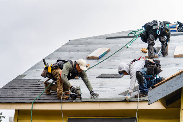 Professional Gutter Installation technician working in Humarock, MA
